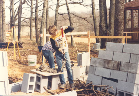 Scott helping with block laying