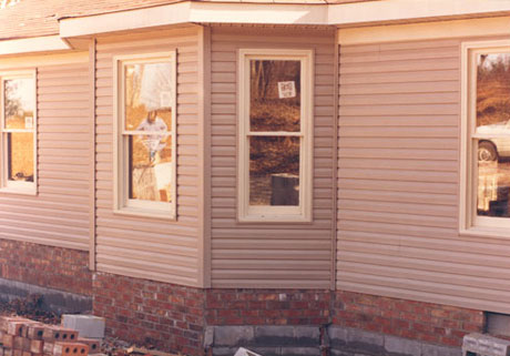 Brick and trim on front bay window